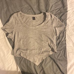 Asymmetrical hem rib-knit top